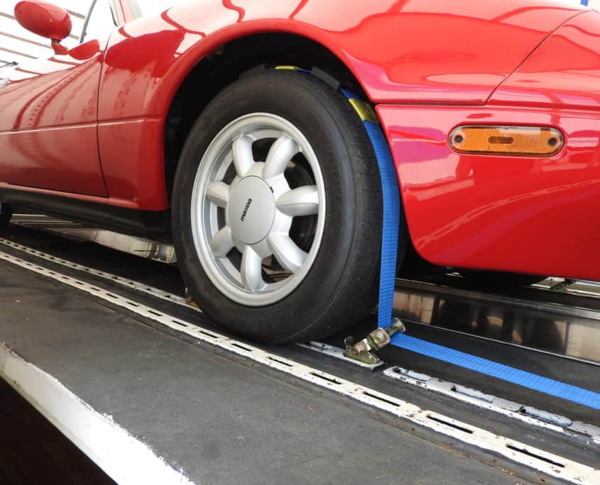 car being shipped in car carrier